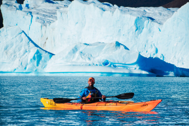 Man kayaking near Perito Moreno Glacier.