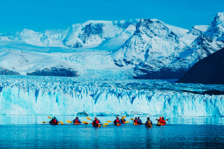 People kayaking near Perito Moreno Glacier.