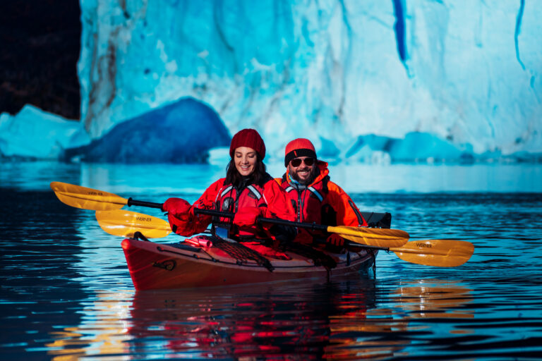 People kayaking near Perito Moreno Glacier.