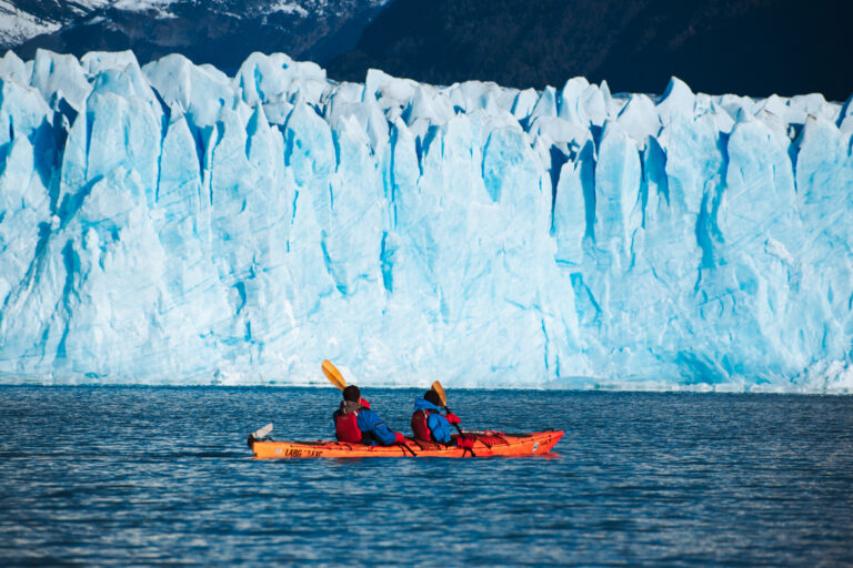 People kayaking near Perito Moreno Glacier.