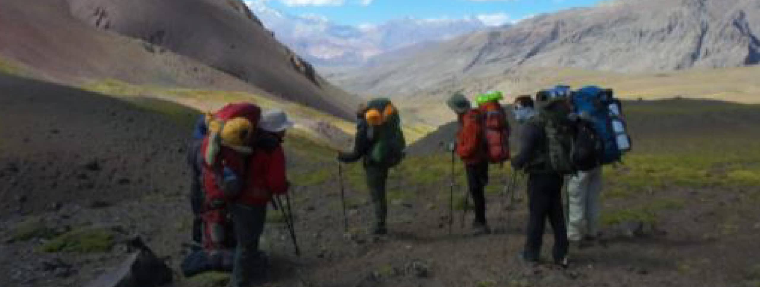 Trekking up to Piuquenes Pass in the Andes